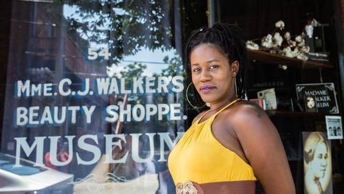 Tamika Newhouse has published 17 books. Newhouse is standing on Auburn Avenue on Wednesday, June 3, 2020. Photo: Jenni Girtman for The Atlanta Journal-Constitution