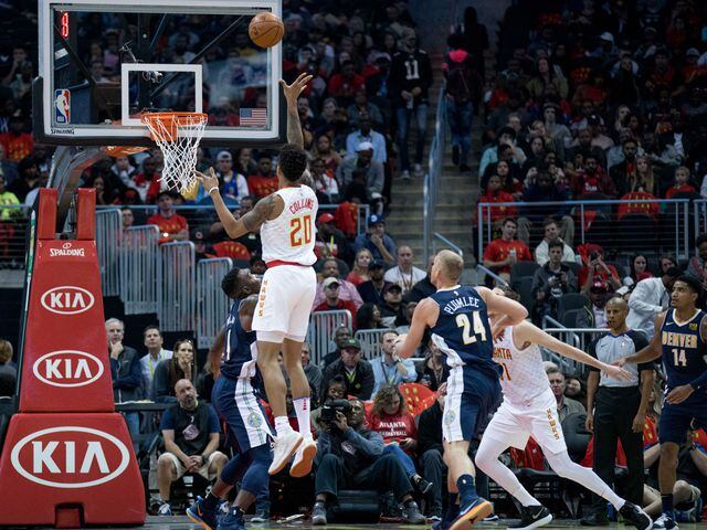 Photos: Hawks drop home opener at renovated Philips Arena