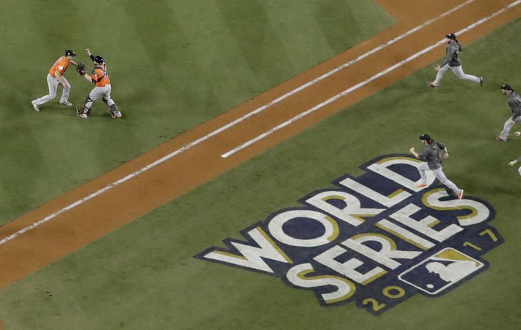 Photos: Ex-Braves McCann, Morton celebrate as Astros win World Series