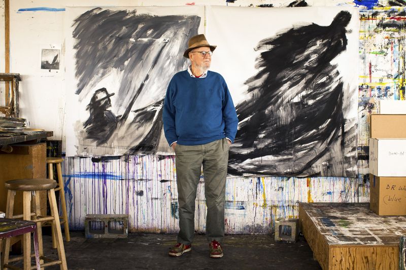 Lawrence Ferlinghetti stands between two recent paintings, “Voyager #1” and “Voyager #2,” at his studio in San Francisco. (Brian Flaherty/The New York Times)