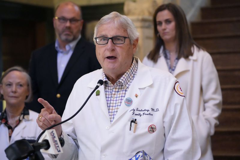 Dr. Randy Easterling, a central Mississippi physician and small business owner, was among a group who urged lawmakers to fully fund a Mississippi Medicaid expansion plan during a Tuesday, April 23, 2024, news conference at the state Capitol in Jackson, Miss. (AP Photo/Rogelio V. Solis)