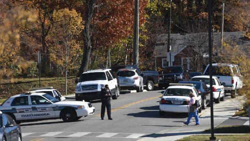 A Chattanooga police officer was shot three times Thursday, leading to an hours-long manhunt. (Credit: Chattanooga Times Free Press)