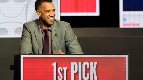 Atlanta Hawks General Manager Landry Fields smiles after NBA Deputy Commissioner Mark Tatum announced that the Hawks won the first pick in the 2024 NBA draft, during the NBA basketball draft lottery in Chicago, Sunday, May 12, 2024. (AP Photo/Nam Y. Huh)