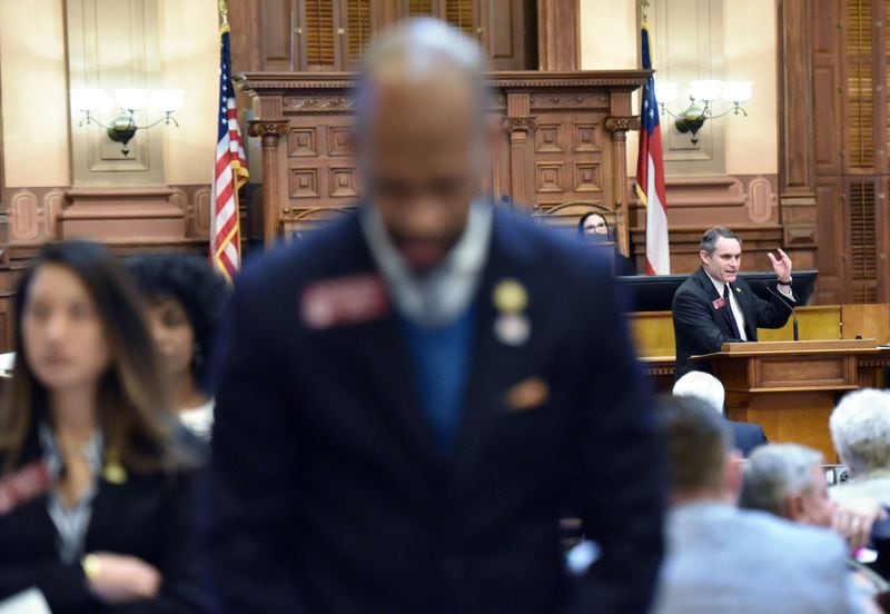 Democrats turn their backs on state Rep. Ed Setzler (right), R-Acworth, as he speaks in support of House Bill 481, outlawing most abortions once a doctor can detect a heartbeat in the womb. HYOSUB SHIN / HSHIN@AJC.COM