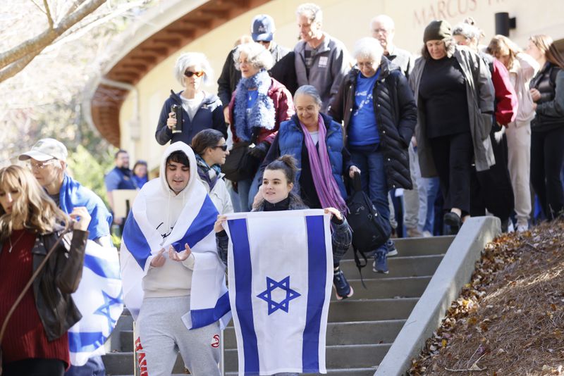 Emory students, in solidarity, came together with their Jewish counterparts at the Hillel building near campus for a peaceful march on Wednesday, November 1, 2023. Similar gatherings occurred on campuses throughout Georgia as part of the statewide initiative "Walk with Hillel."
Miguel Martinez /miguel.martinezjimenez@ajc.com