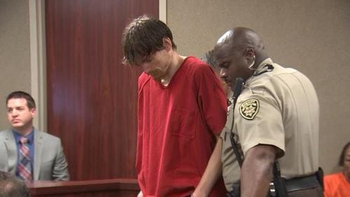 Justin Hess, 31, is accused of shooting his mom 17 times and stabbing a band and drama teacher to death. (Credit: Channel 2 Action News)
