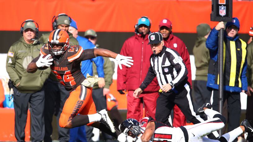 CLEVELAND, OH - NOVEMBER 11: Nick Chubb #24 of the Cleveland Browns breaks free from Sharrod Neasman #41 of the Atlanta Falcons in the first quarter at FirstEnergy Stadium on November 11, 2018 in Cleveland, Ohio. (Photo by Gregory Shamus/Getty Images)