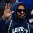 January 21, 2017, Atlanta - Entertainer Andre 3000, half of the rap duo Outkast, waves to the crowd during the Women's March in Atlanta, Georgia, on Saturday, January 21, 2017. (DAVID BARNES / DAVID.BARNES@AJC.COM)