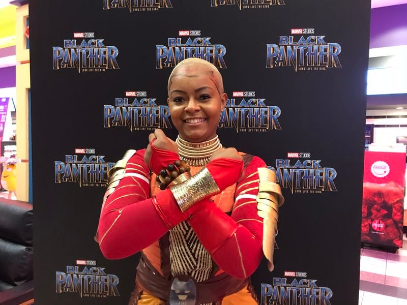  Atlanta's Alexandra Gainous, an actor and model, dressed up as General Okoye in "Black Panther" played by Danai Gurira, to a screening of the film Tuesday night at Regal Cinemas in Atlantic Station. CREDIT: Rodney Ho/rho@ajc.com