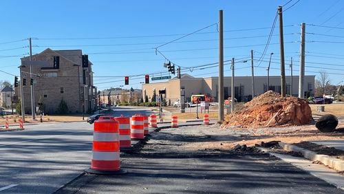 Work continues on intersection improvements at Bush Road and Medlock Bridge Road in Peachtree Corners. (Photo by Karen Huppertz for the AJC)