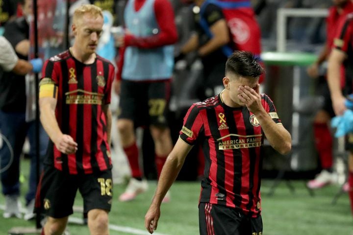 Atlanta United forward Manuel Castro (15, right) and defender Jeff Larentowicz (18) react after their 2-1 loss to Miami at Mercedes-Benz Stadium Saturday, September 19, 2020 in Atlanta. JASON GETZ FOR THE ATLANTA JOURNAL-CONSTITUTION