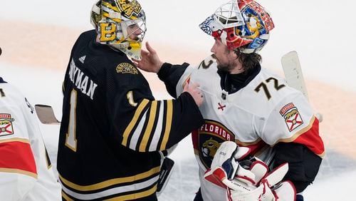 Boston Bruins' Jeremy Swayman (1) and Florida Panthers' Sergei Bobrovsky (72) talk after the Panthers defeated the Bruins in Game 6 of an NHL hockey Stanley Cup second-round playoff series, Friday, May 17, 2024, in Boston. (AP Photo/Michael Dwyer)