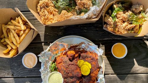 A selection of takeout items from Java Saga Coffee includes fries; the BFC (large Taiwanese fried chicken cutlet); classic Taiwanese chicken nuggets; and a hot chicken sandwich. Wendell Brock for The Atlanta Journal-Constitution