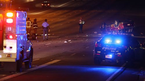 Authorities investigate a deadly wreck on I-85 in Atlanta on Monday night. (BEN GRAY / BGRAY@AJC.COM)