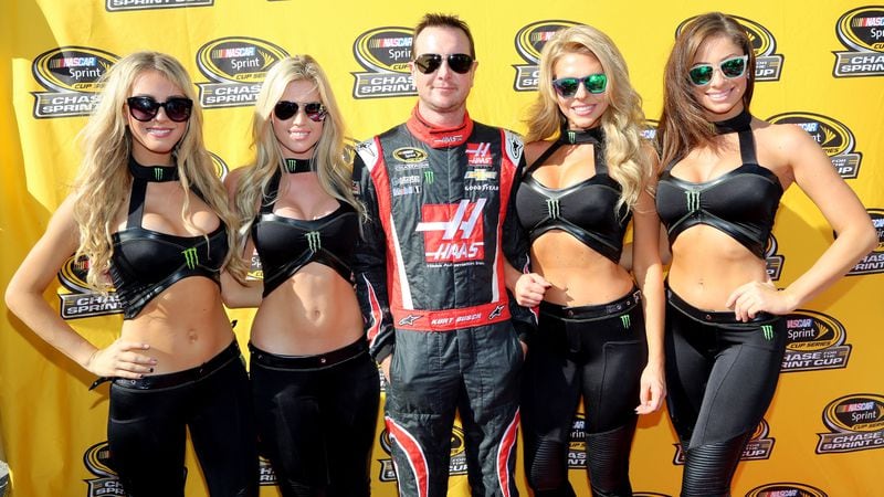 Kurt Busch poses with Monter Energy Girls during pre-race ceremonies at Homestead-Miami Speedway in 2014.