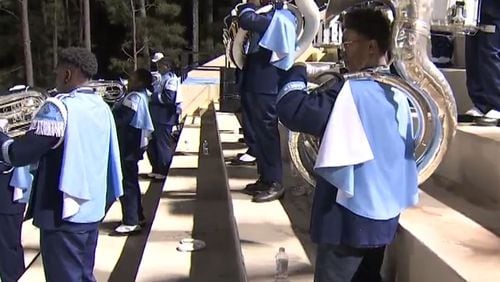 Jahkee Johnson, a 15-year-old Cedargrove High student, manages to play in the marching band despite being a double amputee. (Credit: Channel 2 Action News)