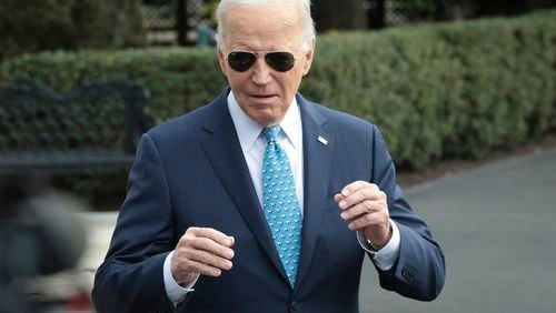 U.S. President Joe Biden answers questions while departing the White House on Tuesday, Jan. 30, 2024, in Washington, D.C.  (Win McNamee/TNS)