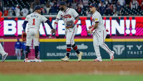 Braves players celebrate their win after beating the Chicago Cubs 7-0 at Truist Park on Tuesday, May 14, 2024, in Atlanta.
(Miguel Martinez/ AJC)