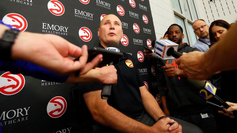 Hawks general manager Travis Schlenk speaks to reporters Thursday, the morning after it was announced the team and coach Mike Budenholzer have decided to part ways.