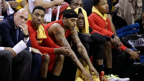 Atlanta Hawks players watch from the bench in the second half against the Cleveland Cavaliers during Game 2 of a second-round NBA basketball playoff series, Wednesday, May 4, 2016, in Cleveland. (AP Photo/Tony Dejak)