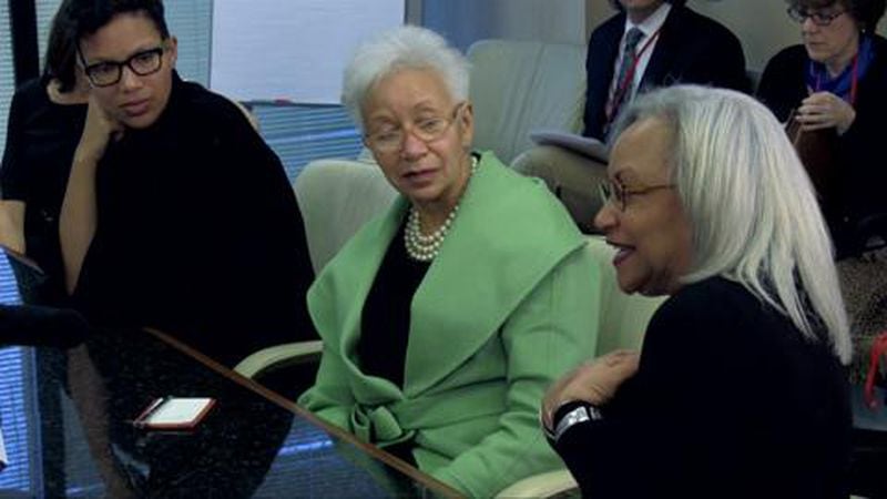 Jane Smith, right, with others discussing women in the workplace. Smith was an active academic, both teaching and putting into practice what she learned by taking on challenges from poverty in Atlanta to international business.