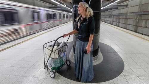 In this Monday, Sept. 30, 2019, photo, Emily Zamourka who is homeless sings at the Wilshire-Normandie station in Los Angeles. Zamourka, whose angelic singing in a Los Angeles subway was captured on video is being offered praise and help.