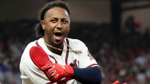 Braves second baseman Ozzie Albies (1) reacts to a single against the Milwaukee Brewers in the sixth inning of Game 4 of the NLDS Tuesday, Oct. 12, 2021, at Truist Park in Atlanta. (Curtis Compton / Curtis.Compton@ajc.com)