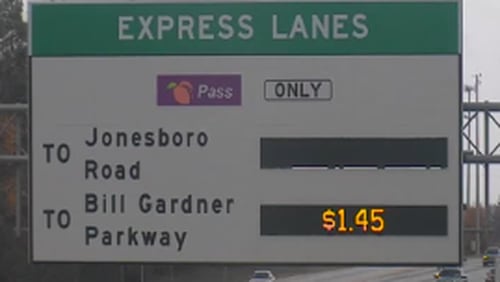 This Express Lanes sign along I-75 in Henry County shows the price for a full trip on the busy day before Thanksgiving on November 27th, 2019.