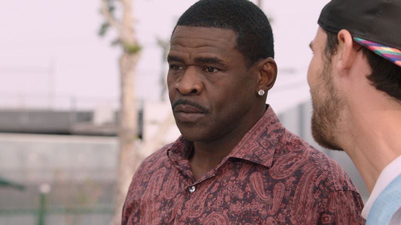Former NFL star Michael Irvin plays an agent in “Slamma Jamma.” CONTRIBUTED