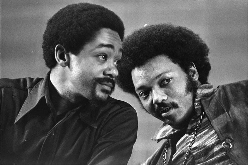 The Rev. Jesse Jackson (right) confers with Bobby Seale, co-founder of the Black Panther Party, at the National Black Political Convention in Gary, Ind., in 1972. Jackson called his Afro "radical," and Seale helped make the style a symbol of Black Power. (AP file)
