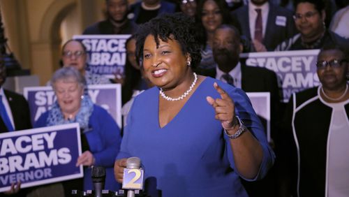 3/6/18 - Atlanta - Stacy Abrams qualified to run for governor this morning.  She was joined by her parents, Rev. Robert Abrams and Rev. Carolyn Abrams, who drove from Mississippi to surprise her, and supporters.   Qualifying for Georgia's 2018  elections began Monday and runs through Friday.  Georgia has races for Governor, Lieutenant Governor and other statewide posts, and every congressional seat nationwide is up for a vote in November.  BOB ANDRES  /BANDRES@AJC.COM