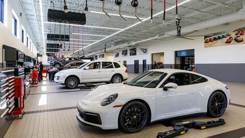 The first freestanding Porsche service center in the United
States has opened its doors near the busy Atlanta airport. The Porsche Service
Center South Atlanta, with 13 lift bays and a design focused on customer comfort
and convenience, is the first step of a multi-million dollar investment in new
features on the campus of Porsche Cars North America, Inc.