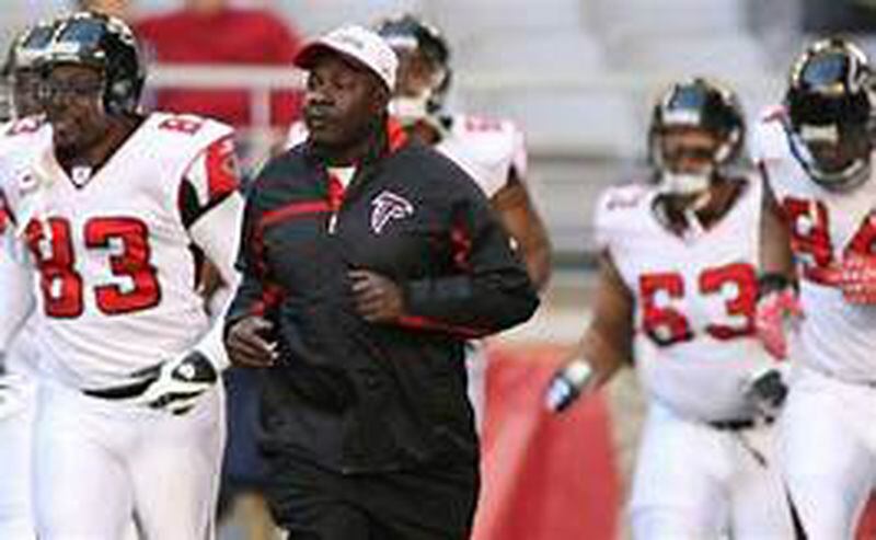 Emmitt Thomas leading the Falcons back in the tough 2007 season. .