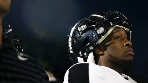 A Colquitt County player looks on during the first half of a high school football game between Grayson and Colquitt County at Grayson High School in Loganville, Ga., on Fri., Sept. 21, 2018. (Casey Sykes for The Atlanta Journal-Constitution)