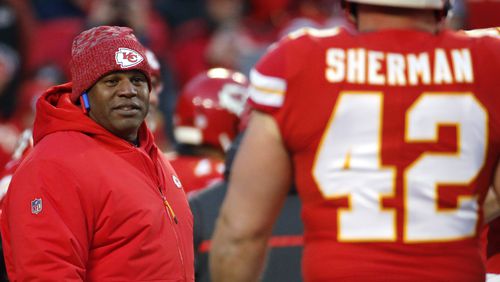 Kansas City Chiefs offensive coordinator Eric Bieniemy watches players before the team's AFC championship game against the New England Patriots Jan. 20, 2019, in Kansas City, Mo. The Chiefs have perhaps the most dynamic offense in the NFL and the San Francisco 49ers feature one of the stingiest defenses in the league. The men in charge of the units got interviews for head coaching but were passed over. (Charlie Riedel/AP)