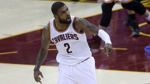 The Cleveland Cavaliers' Kyrie Irving reacts after hitting a three-point shot late in the fourth quarter against the Golden State Warriors during Game 4 of the NBA Finals at Quicken Loans Arena in Cleveland on Friday, June 9, 2017. Irving asked team owner Dan Gilbert to be traded. (Phil Masturzo/Akron Beacon Journal/TNS)