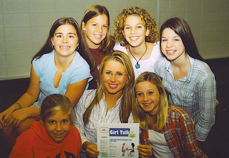 Haley Kilpatrick (center) poses for a photo with members of the very first Girl Talk chapter at Deerfield-Windsor School in Albany. She was 16 when the picture was taken in 2002. CONTRIBUTED BY HALEY KILPATRICK