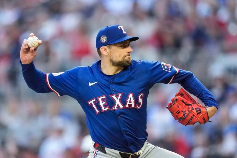 Texas Rangers pitcher Nathan Eovaldi works in the first inning of a baseball game against the Atlanta Braves Saturday, April 20, 2024, in Atlanta. (AP Photo/John Bazemore)