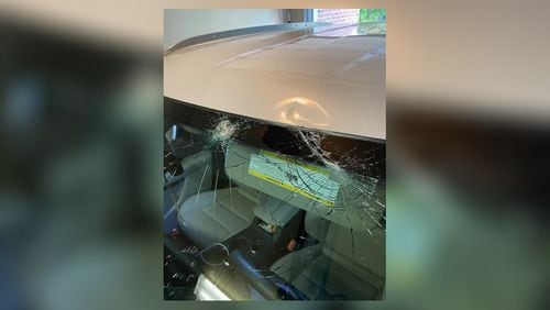 Rocks that fell from the Allgood Road bridge Wednesday night dented the roof and shattered the windshield of this vehicle.