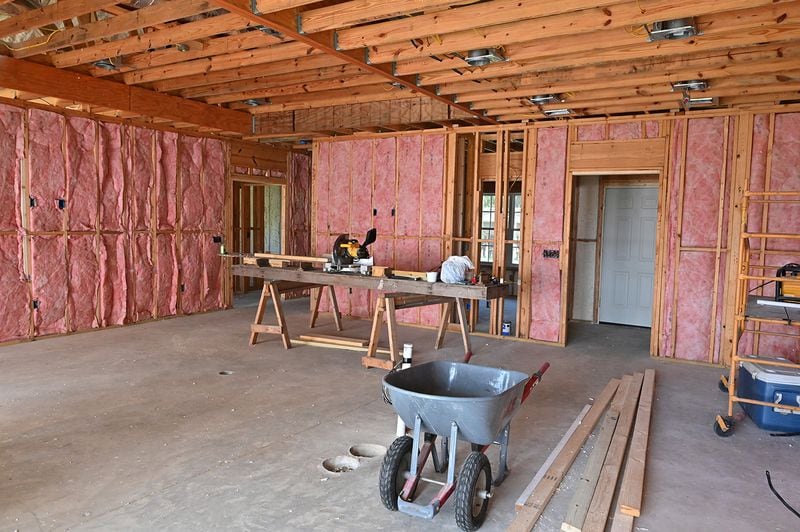 Security footage from the home under construction on Satilla Drive shows a young man who might be Ahmaud Arbery visiting the property several times since last fall. (Hyosub Shin / Hyosub.Shin@ajc.com)