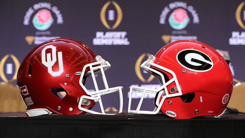 December 28, 2017 Los Angeles: The Georgia and Oklahoma helmets sit on a table during press conferences by the teams for the Rose Bowl Game on Thursday, December 28, 2017, in Los Angeles.    Curtis Compton/ccompton@ajc.com