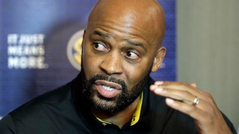 FILE - In this Oct. 18, 2017, file photo, Missouri head coach Cuonzo Martin answers questions during the Southeastern Conference men's NCAA college basketball media day in Nashville, Tenn. Martin is no stranger to Missouri, having grown up just across the Mississippi River in East St. Louis and coached in the state before at Missouri State. Now the former Tennessee and Cal coach is back home with the Tigers, where he thinks the rejuvenated basketball program could be a much-needed source of pride for a Missouri campus still reeling from student protests two years ago. (AP Photo/Mark Humphrey, File)