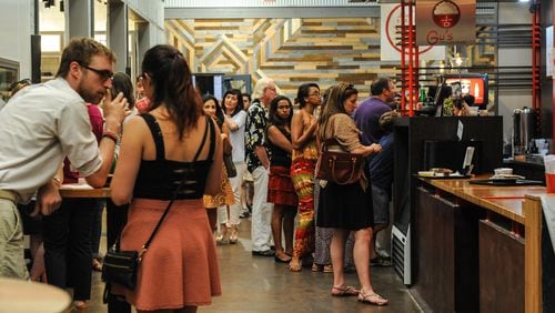 Gu's Dumpling crowd line up inside Krog Street Market on Aug. 7, 2015. (Beckysteinphotography.com)