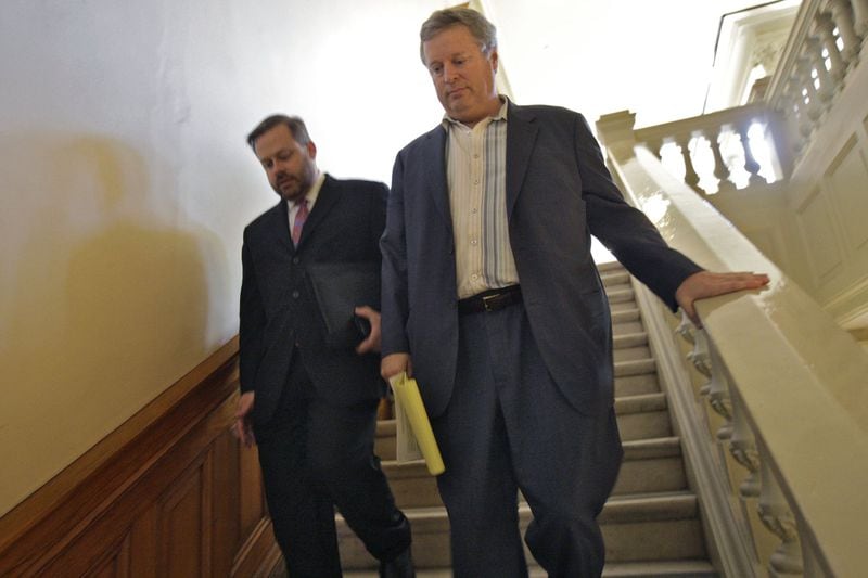 Don Balfour (right) — at the time a Republican state senator — and his lawyer Robert Highsmith head down the steps of the Georgia Capitol to the Senate mezzanine meeting room for Balfour’s hearing on August 16, 2012. Balfour was accused of ethics violations. (BOB ANDRES / BANDRES@AJC.COM)