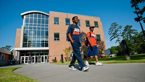 Students at Clayton State University walk across campus. One survey has ranked the university's online program as one of the best.
