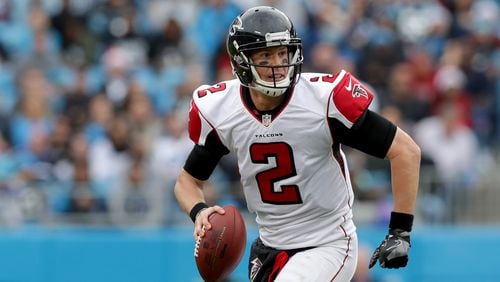 CHARLOTTE, NC - DECEMBER 24: Matt Ryan #2 of the Atlanta Falcons runs the ball against the Carolina Panthers in the 3rd quarter during their game at Bank of America Stadium on December 24, 2016 in Charlotte, North Carolina. (Photo by Streeter Lecka/Getty Images)
