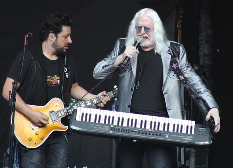  Edgar Winter (and guitarist Doug Rappoport) plays one of many instruments during his set. Photo: Melissa Ruggieri/AJC