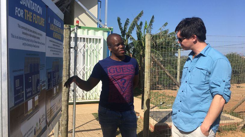 Shannon Yee, a Georgia Tech engineering professor, was in South Africa in August looking over sanitation systems and prototypes of self-contained toilets that process the waste inside the units. Courtesy of Shannon Yee.