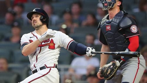 Braves outfielder Adam Duvall hits a three-run homer during the first inning Tuesday against the Washington Nationals at Truist Park. (Curtis Compton / Curtis.Compton@ajc.com)