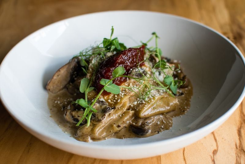 Silk handkerchief pasta with roasted wild mushrooms, porcini cream, tomato marmalade and cotija cheese at Better Half. / CONTRIBUTED BY HENRI HOLLIS